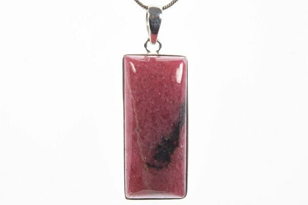 A pendant fashioned from Madagascar rhodonite.